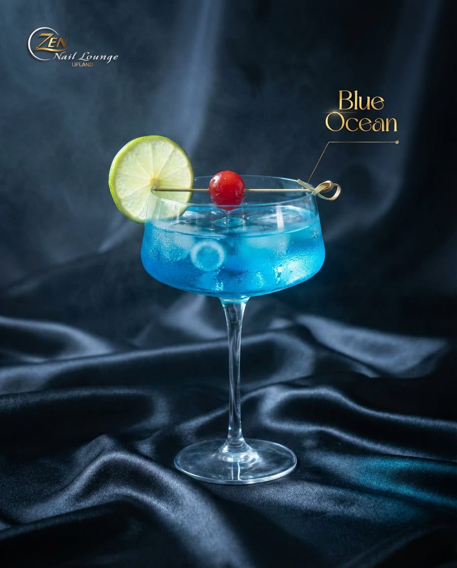 Refreshing Blue Ocean cocktail with lime and cherry garnish at Zen Nail Lounge Upland.
